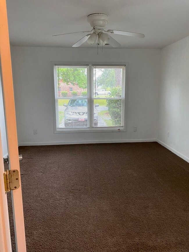 Building Photo - COMING SOON! 4Br, 2.5 baths, large kitchen, large bedrooms, fence, storage and more! N. College R...
