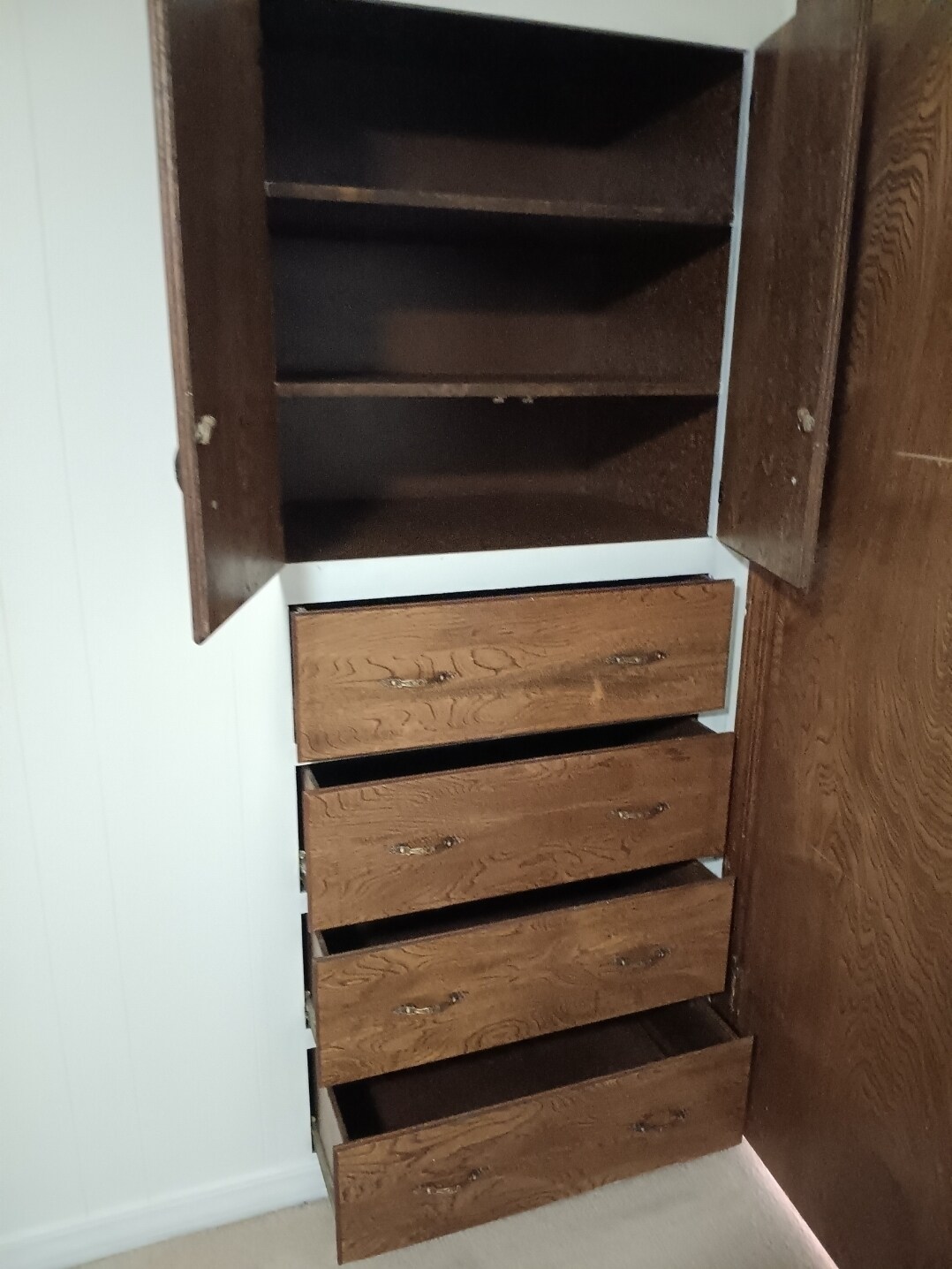 Deep dresser drawers and large cabinet. Door goes into the hall. - 2308 Wesley Cir