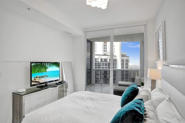 Building Photo - 18201 Collins Ave