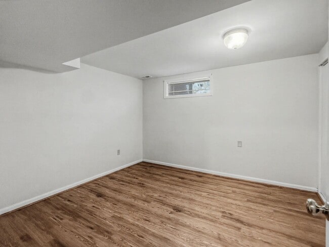 Building Photo - Furnished 4BD 2BA Home with Two kitchens, Basement, and Garage!