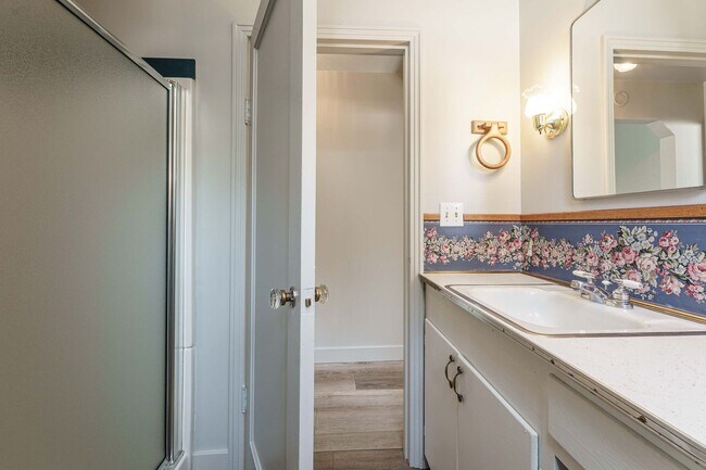 Building Photo - MOVE IN SPECIAL - Charming 1950’s Two-Bedroom with Character & Shared Outdoor Space