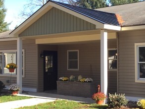 Building Photo - The Apartments at Carriage Pines