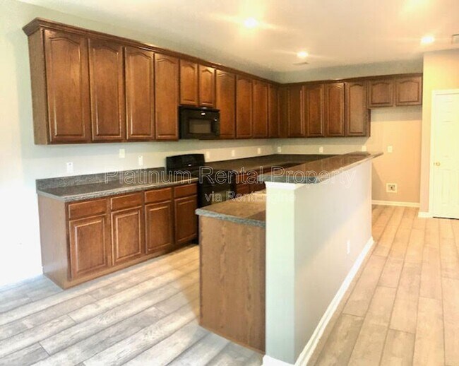 Building Photo - 6205 Park Leaf Walk