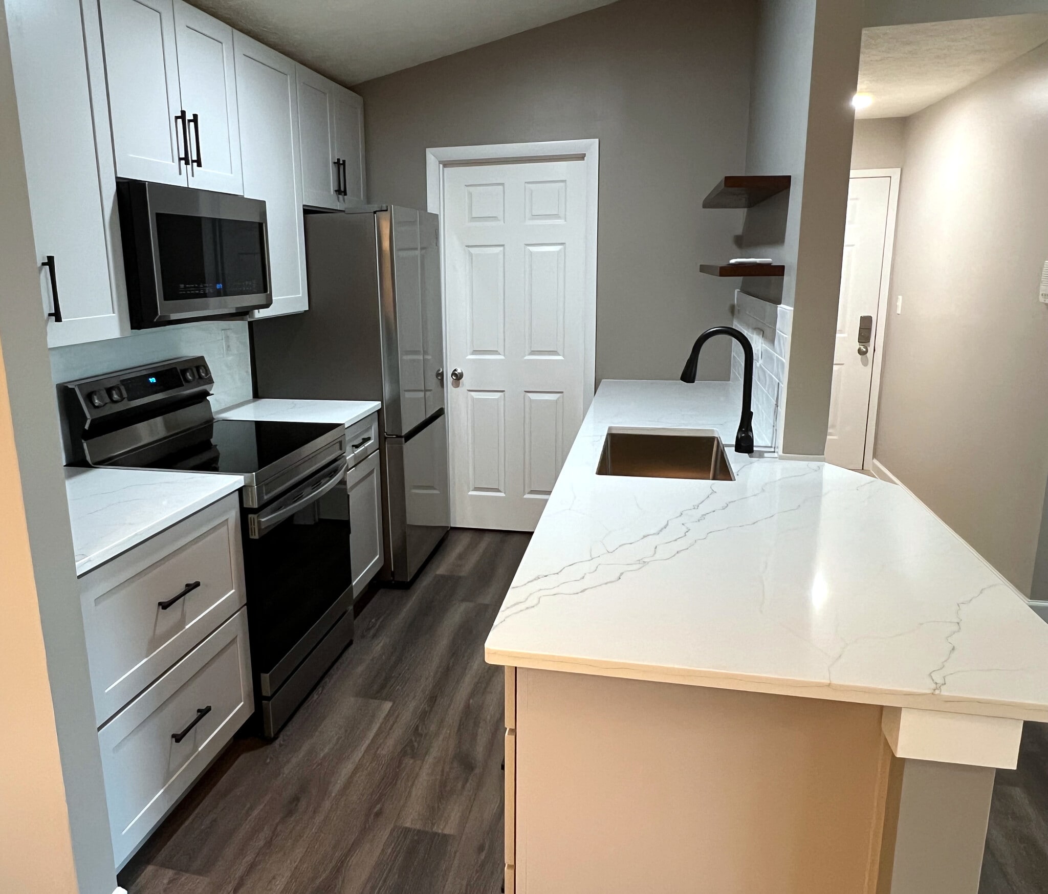 Newly Remodeled Kitchen with New Cabinets, Subway Tiles & Beautiful White Granite Countertops - 8892 Eagleview Dr
