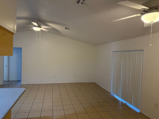 Building Photo - READY TO MOVE INTO 3/2/2 WITH IDEAL LOCATI...