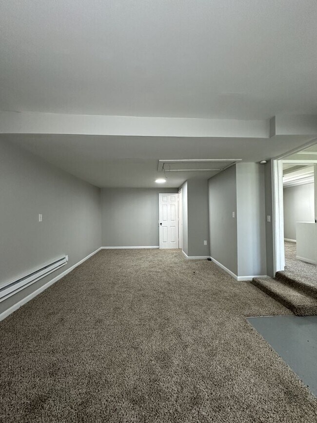 Building Photo - Backyard Nights & Front Porch Mornings — Cozy 3BR Brick Ranch in Fairlawn