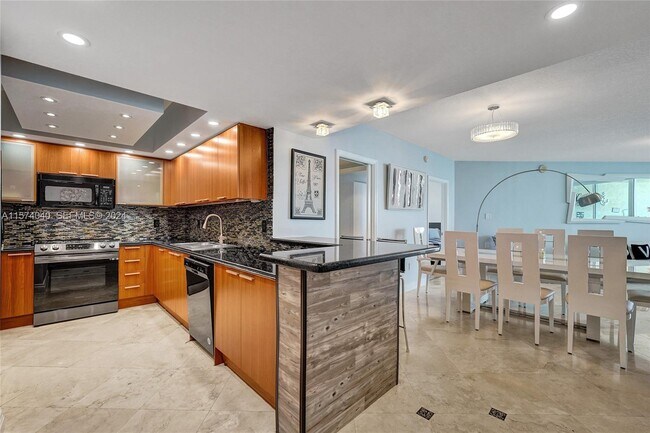 Building Photo - 16699 Collins Ave