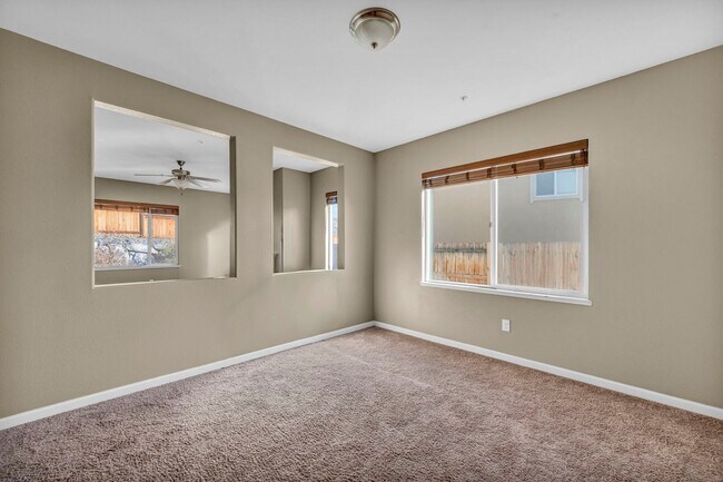 Building Photo - Sun-Filled, Spacious Living with a Three-Car Garage