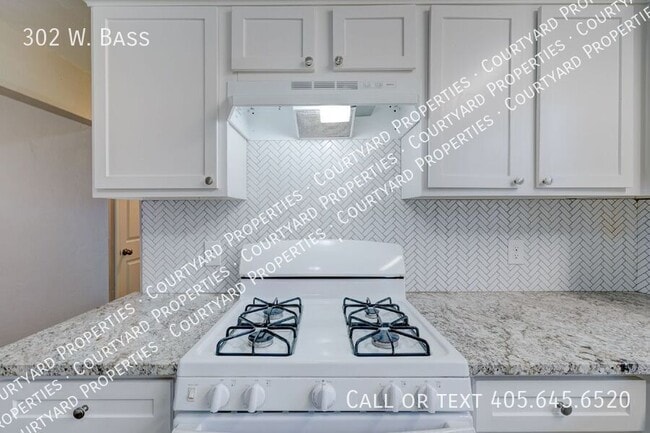 Building Photo - 302 W. Bass-