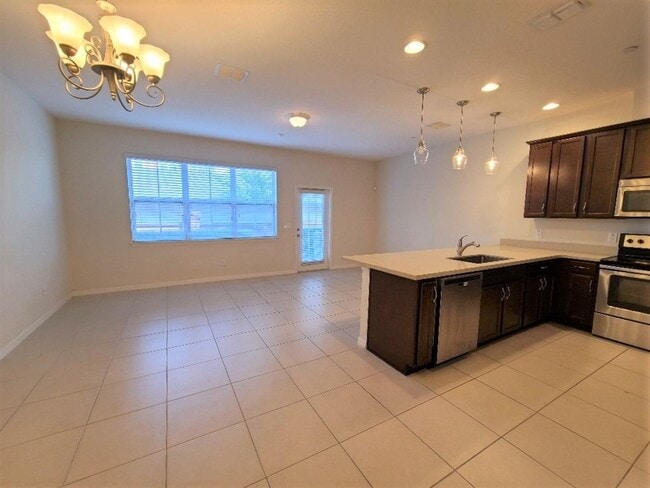 Building Photo - 3br 2.5ba at OVIEDO ON THE PARK. Tile floo...