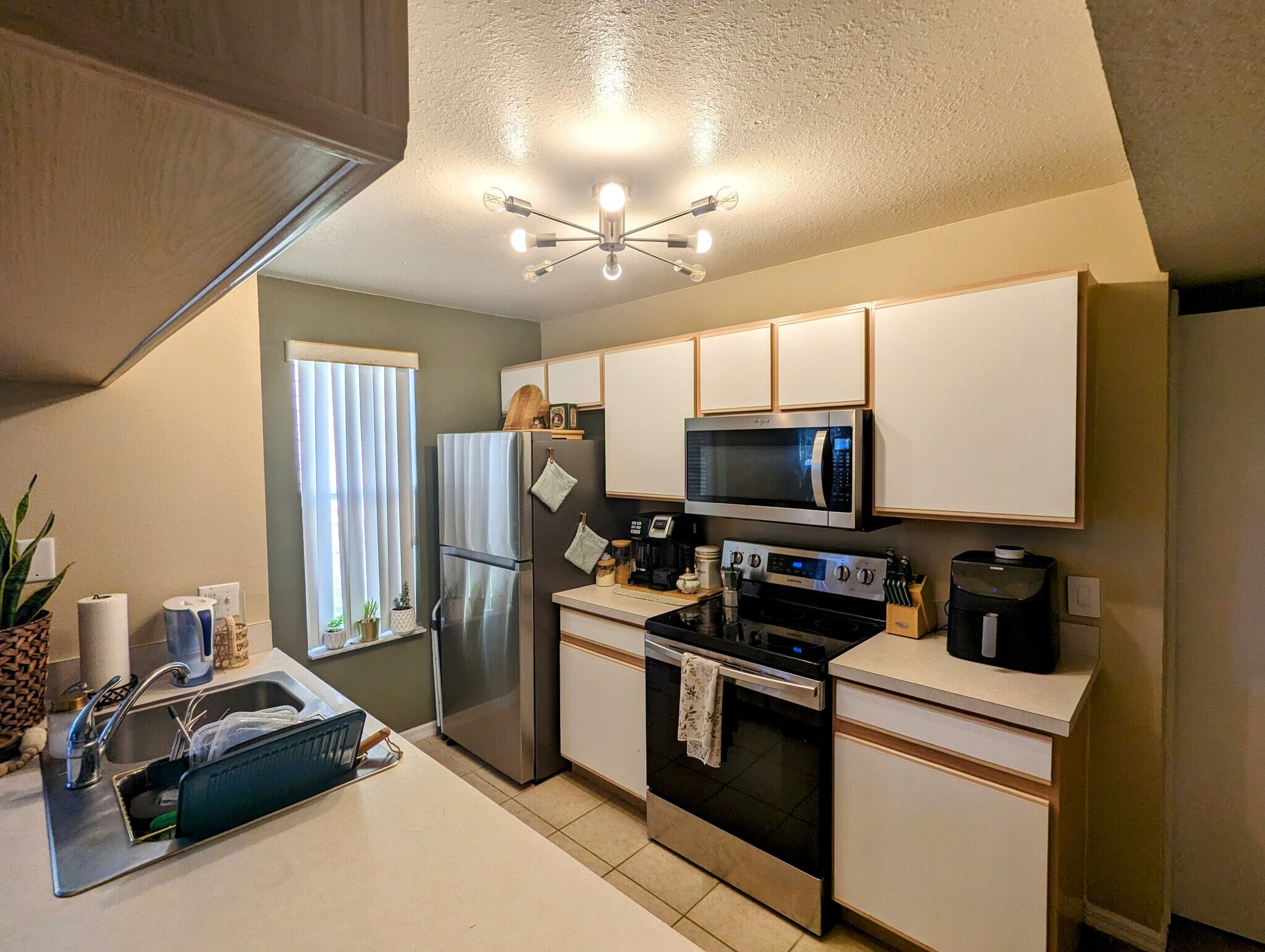 Galley Kitchen with electric range and built in pantry - 3145 Britannia Blvd