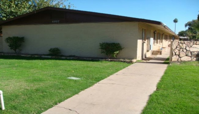 Building Photo - Desert Village Apartments