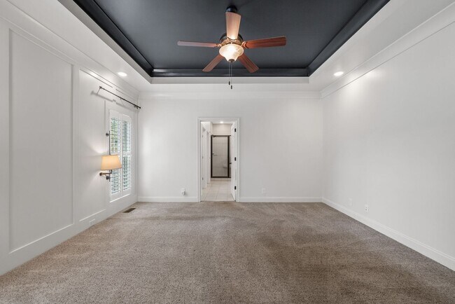Building Photo - Elegant 4-Bedroom Home with Vaulted Ceilin...