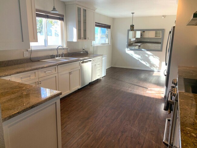 Building Photo - Well maintained tree street home with garage