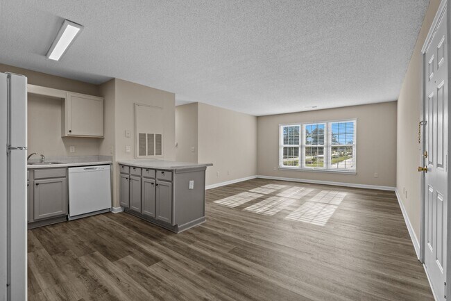 Building Photo - Time to unwrap your holiday gift from us! Apply before Friday and we will waive your application ...