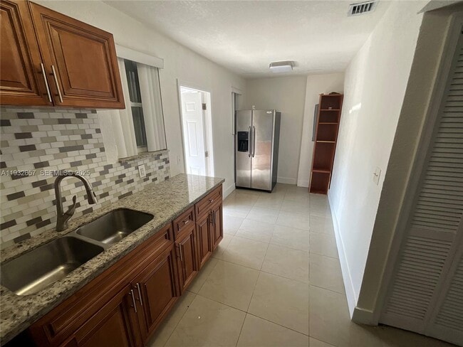 Building Photo - 1064 NW 103rd St