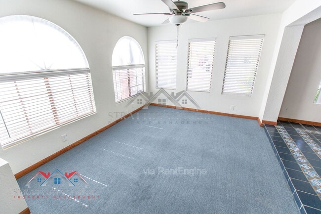 Building Photo - 8119 E Amelia Ave