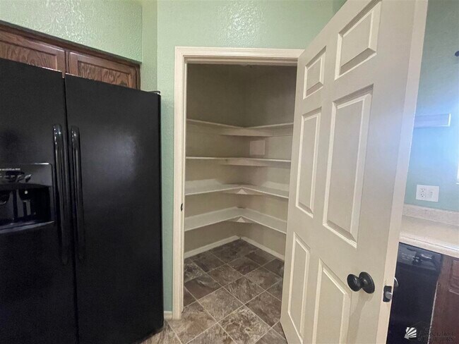 Building Photo - 9027 E 31st Ln