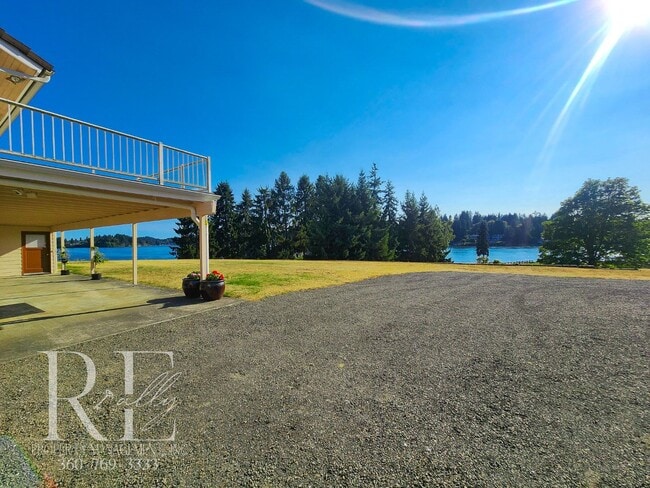 Building Photo - Waterfront Views & Peaceful Living – 2BR w...