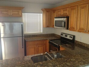 Building Photo - 2BR/2BA Ground-Floor Condo in Palm Beach Grande