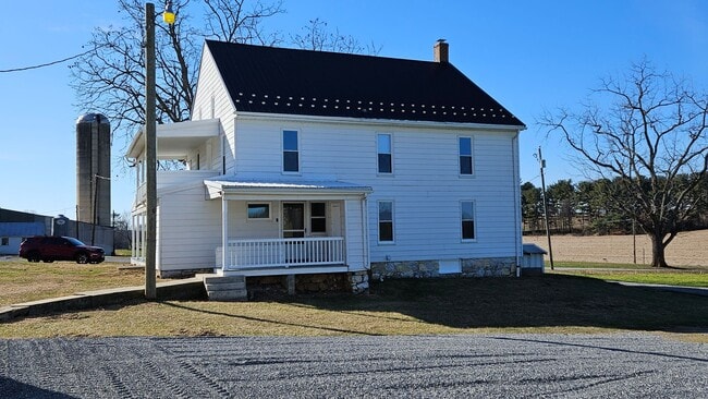 Building Photo - Country Living in This 4 Bedroom Farmhouse!