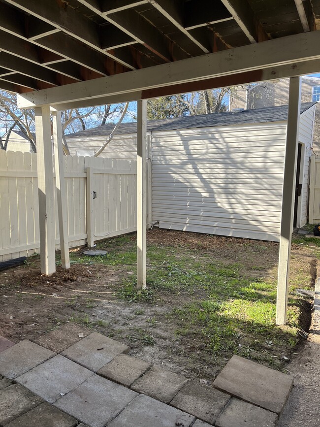 Fenced in back yard with shade and storage - 403 Hobbs Rd SE