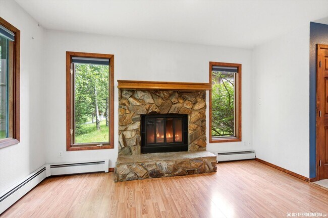 Building Photo - Cozy Eagle River Home with Backyard Trails!