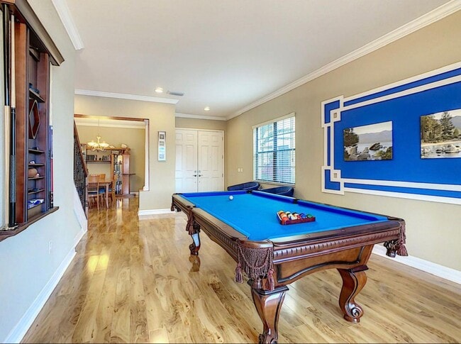 Building Photo - Luxury Living in Woodland Lakes Preserve: Fully-Furnished