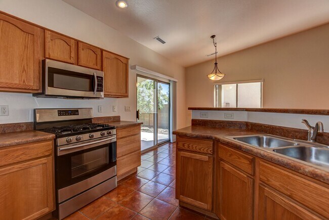 Building Photo - 5879 N Bronco Ln