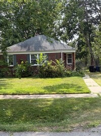 Building Photo - Cute and Cozy freshly painted 2 bedroom, 1 bath brick ranch on a double fenced in lot