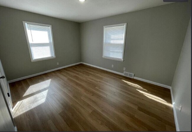 Building Photo - Welcome to Your Next Home with Harvest Investments!