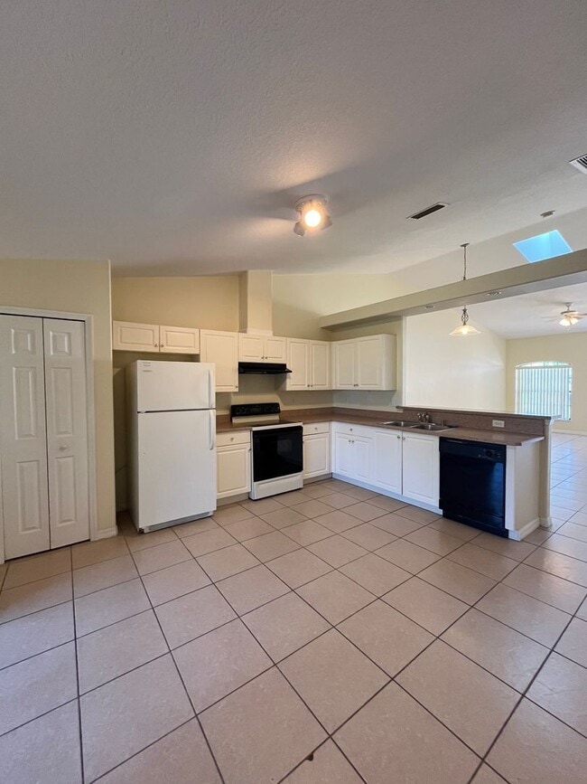 Building Photo - THIS WONT LAST LONG!!!! 3/2 ALL TILE!!!