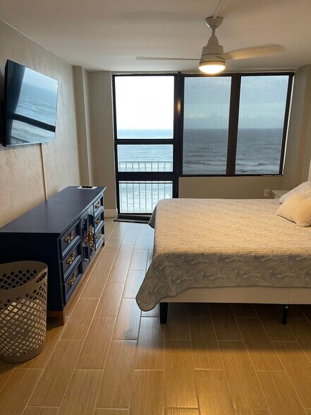 Master bedroom with king bed - 3043 S Atlantic Ave