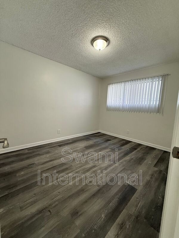 Building Photo - 13448 1/2-13612-22 Doty Ave