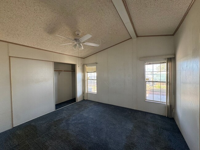 Building Photo - Sunrise Vista -2 Br, 2Ba home with covered carport, fenced yard, storage