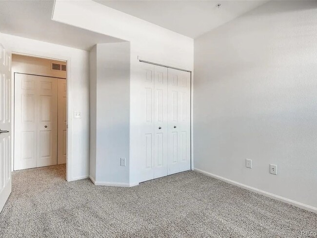 Building Photo - Beautiful 2 Bed/2 Bath Condo with Private Balconies, Pool Access & Golf Course Community