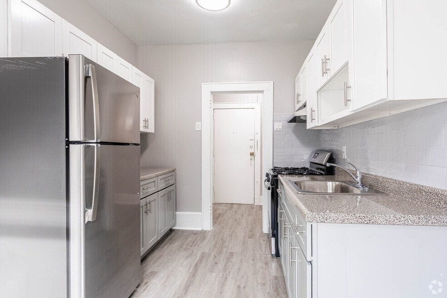Classic architectural charm complemented by modern updates. - Orange Portfolio Holdings