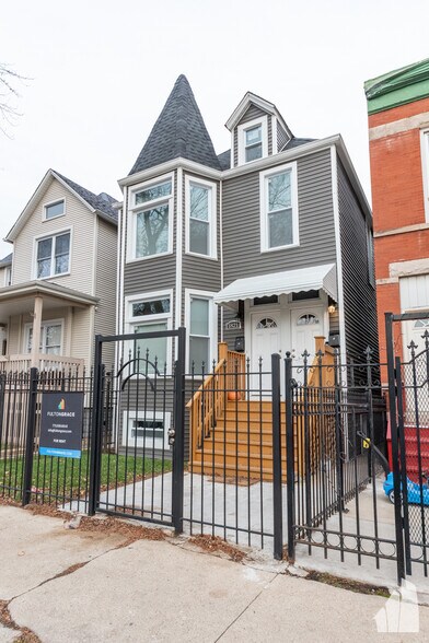Building Photo - 1821 N Tripp Ave