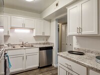 Newly remodeled kitchens in select homes - Colonial Towne Apartments