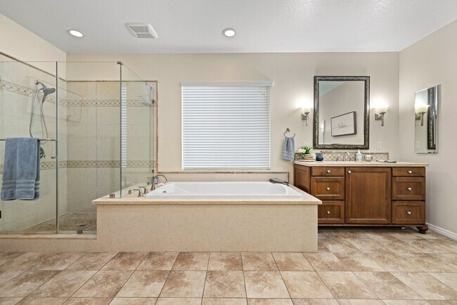 Building Photo - Luxurious 5-Bedroom Pool Home with Solar &...