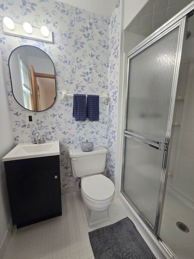 Building Photo - Updates abound at this SPACIOUS, half duplex with 3+ off-street parking spots, 3-bedrooms and 2 f...