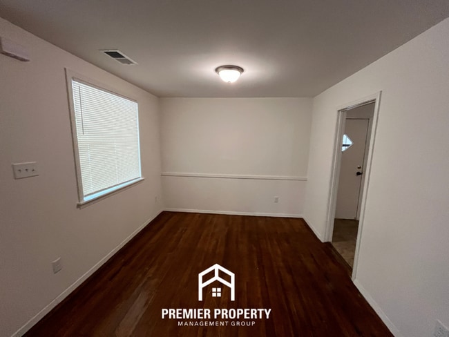 Building Photo - Spacious 3BR/2BA Home with Den & Living Room | Brick Fireplace & Large Yard