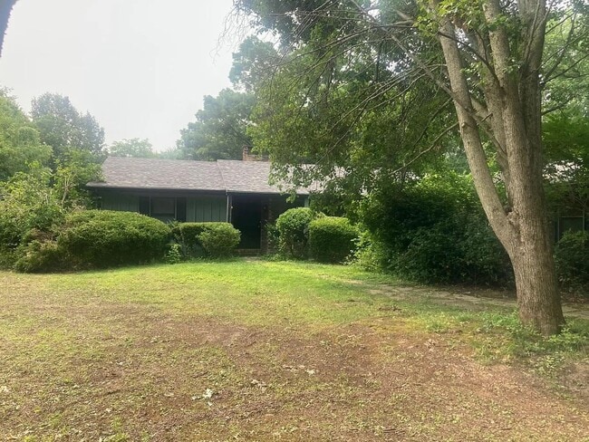 Building Photo - Beautiful Duplex Located in Serene, Wooded...