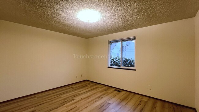 Building Photo - Updated 2 Bedroom Featuring New Plank Flooring