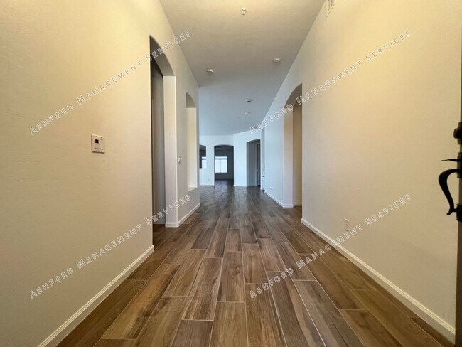 Building Photo - COME HOME TO LUXURY IN GATED GRAYHAWK GOLF...
