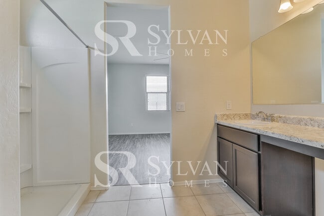 Building Photo - This charming home is ready for your personal touch!