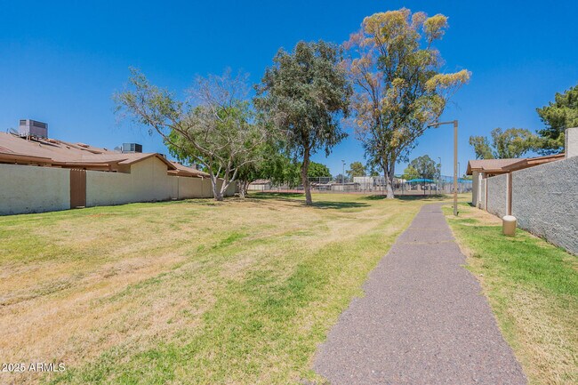 Building Photo - 2609 W Emile Zola Ave