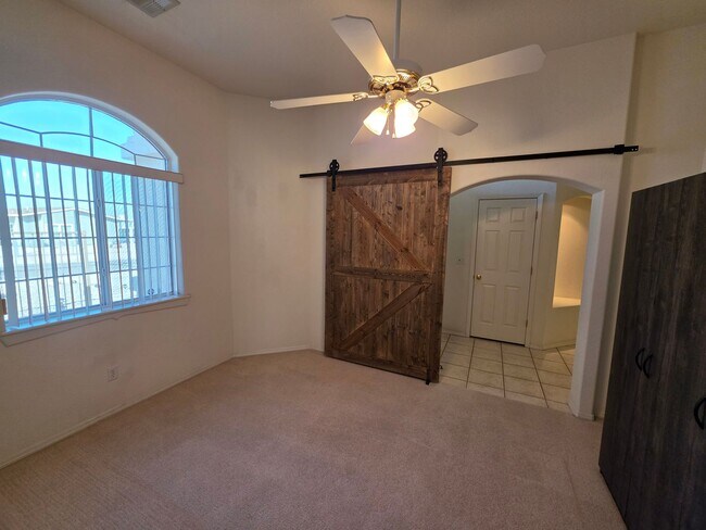 Building Photo - Spacious 3-Bedroom Home with RV Parking & 3-Car Garage in Bullhead City