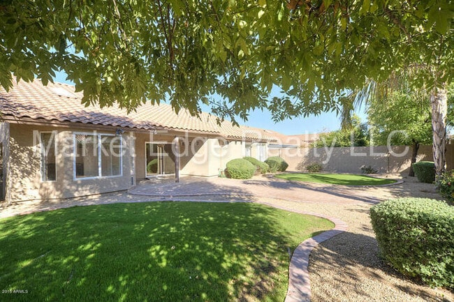 Building Photo - 4Bed/2Bath House at 48th St/Warner! JOIN T...