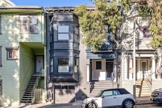 Building Photo - Bernal Heights: Remodeled Unfurnished Top Floor Condo w/ Garage Parking & Shared Yard